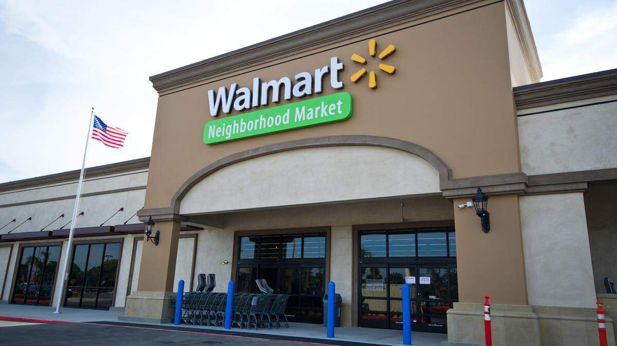 Walmart's Neighborhood Markets are typically smaller than the discount retailer's other stores. They sell produce and meats, frozen foods and groceries, health and beauty products, and pet and cleaning supplies. Most have a drive-thru pharmacy. This is an entrance to a Neighborhood Market in California.