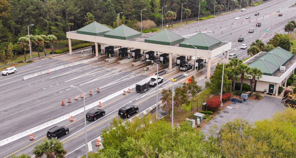 Traffic barrels and barriers direct drivers on the Cross Island Parkway to the outside lanes — as seen in this drone photo taken on Thursday, March 30, 2022 — as workers prepare to remove the parkway’s toll booths on Hilton Head Island. Previous reporting noted that as part of the project, demolition, construction and new signage stretching from U.S. 278 Business to the Charles E. Fraser Bridge should be finished by year’s end.