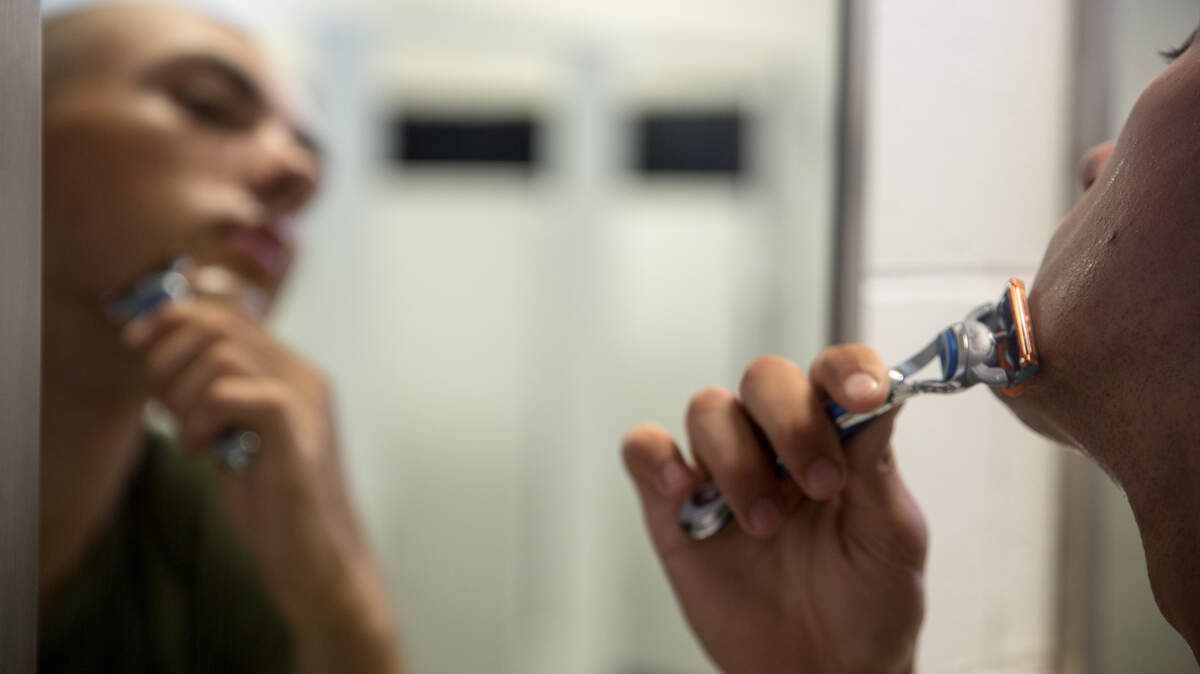 A U.S. Marine Corps recruit shaves to prepare for his first official Marine Corps photo April 27, 2017, on Parris Island, S.C.