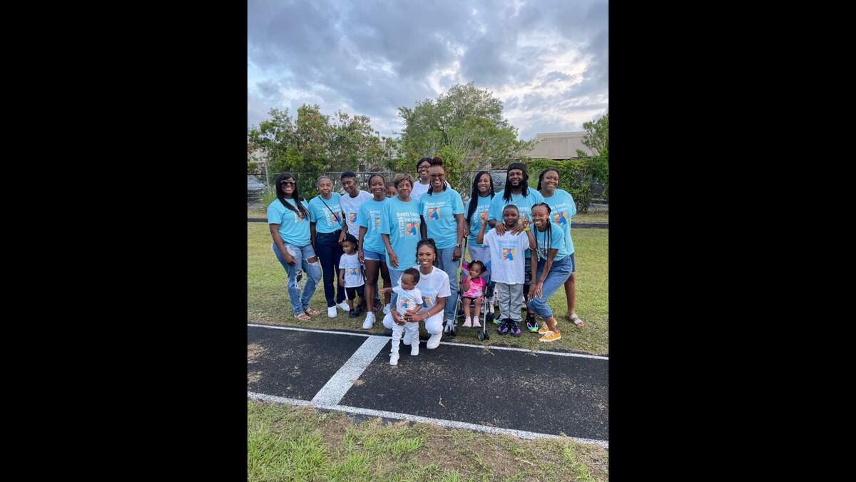 Family members gather for what would have been the high school graduation of Khalil Singleton, an 8-year-old who was hit and killed by a stray bullet in 2012. Khalil’s name was read out loud alongside other graduates accepting their diplomas at Hilton Head High School’s 2022 graduation ceremony Wednesday. 