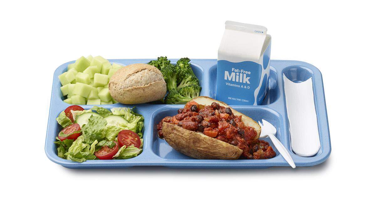 School meals must meet federal meal pattern requirements, but school districts choose what foods go on the menu. This is an example lunch tray from Greenville County Schools, South Carolina.