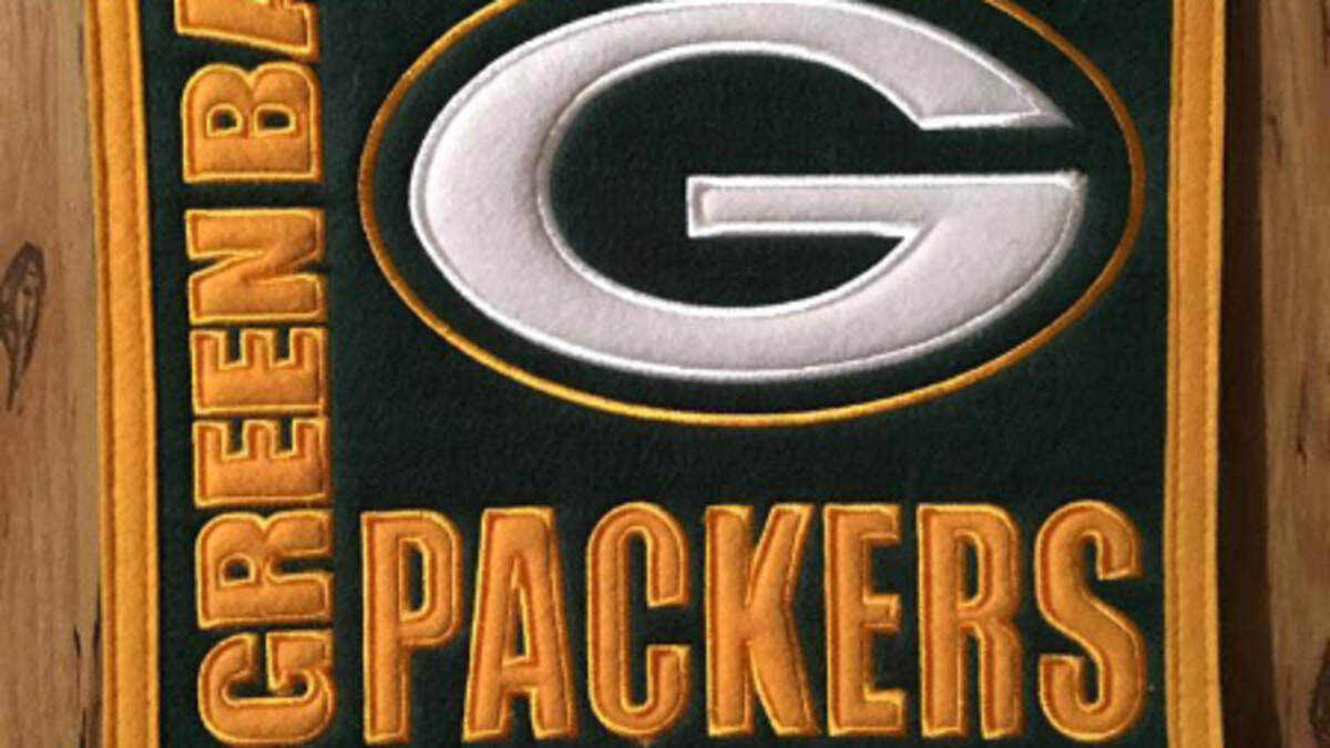A Green Bay Packers banner.