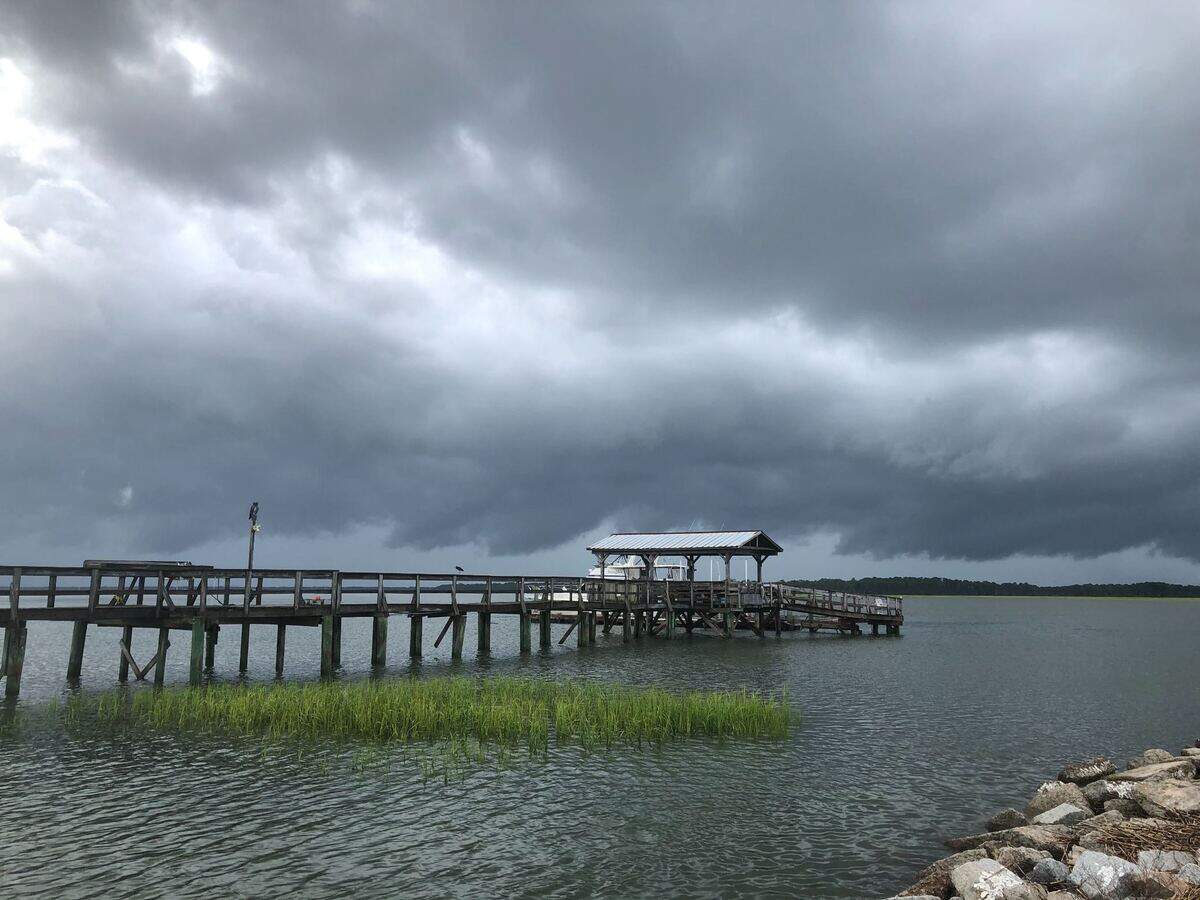 Gray clouds form over Alljoy Boat Landing in Bluffton Monday morning as the town prepares for Tropical Storm Isaias.