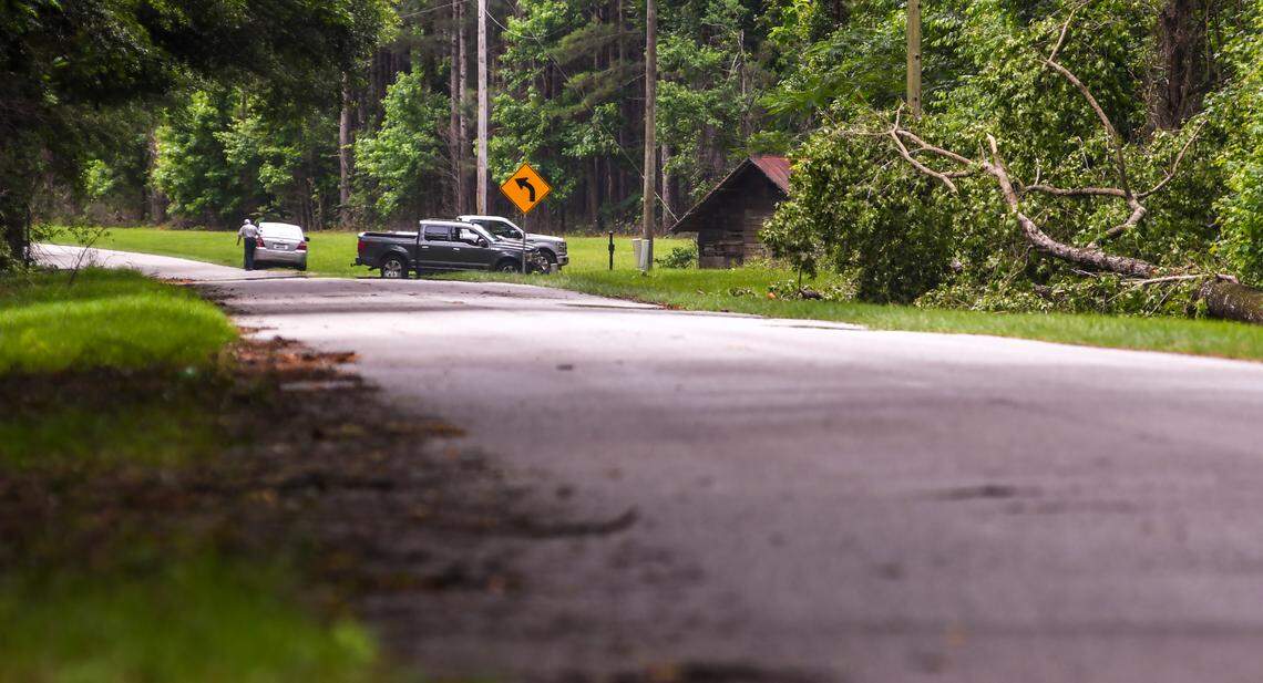Men in trucks block Moselle Road near the entrance to the Murdaugh property on Tuesday, June 7, 2021 where Maggie Murdaugh, 52, and her son Paul Murdaugh, 22, died from gunshot wounds in an apparent homicide in Colleton County.