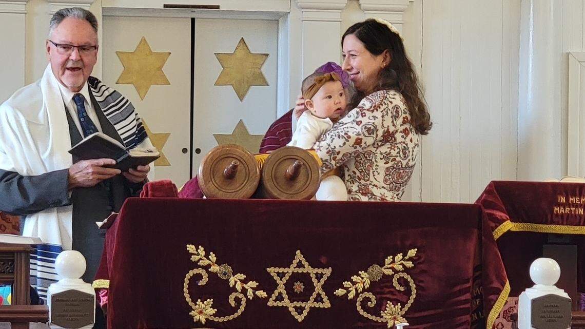 Rabbi Stephen Stern oversees a baby-naming ceremony at Beth Israel Synagogue in Beaufort. Stern spent 30 years as a rabbi in New York City’s Staten Island before moving south. He adapted: “I just had to listen to the southern style, which is speaking slower and singing slower and being open to adapting to whatever the congregation needs.”