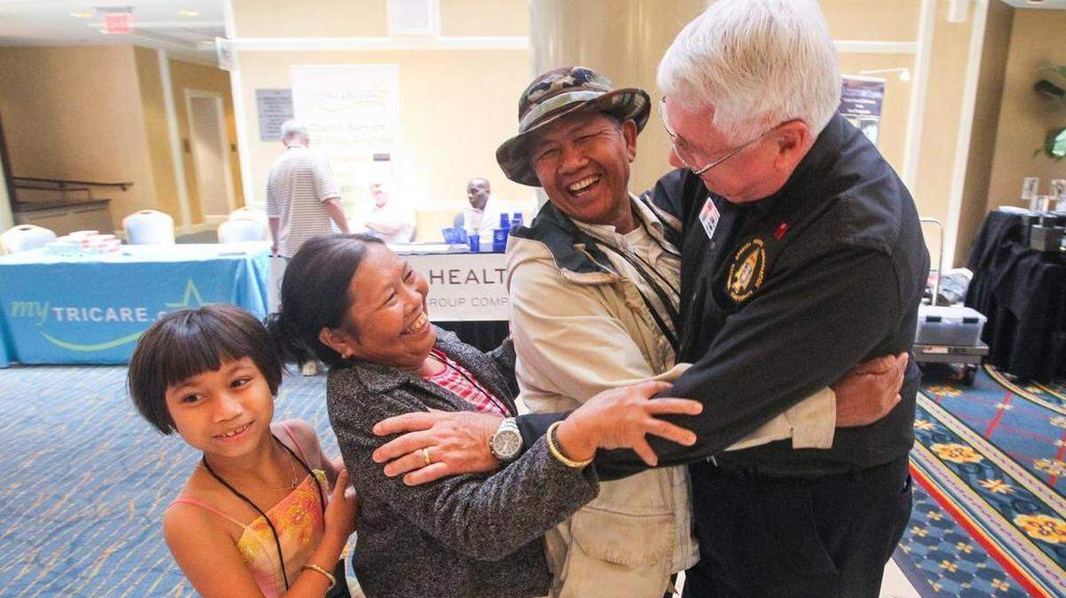 Green Beret veteran John Rollinson greets Chen Ksor and his wife, Iong, during The National Special Forces Association’s 50th annual conference held in Columbia, S.C., in 2013. Ksor is a member of the Dega people of the Central Highlands in Vietnam. They met during the war when the Dega, known also as the Montagnards, fought alongside the Americans. Chen was only 12 years old when he was fighting alongside Rollinson. He and his family now live in Asheboro, NC.
