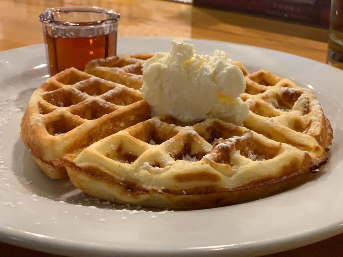 Waffles are served with farm-stand butter and warm maple syrup at Nectar Farm Kitchen on Hilton Head Island.