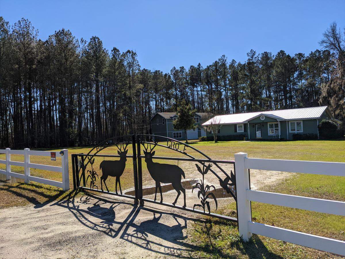A gate bearing a S.C. Department of Natural Resources logo blocks the entrance to property in Hampton County, S.C. owned by the Badger family and the son of Bluffton real estate agent Nickey Maxey, who sits on DNR’s law enforcement advisory committee.