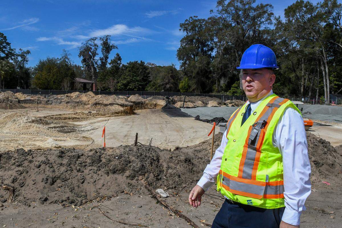 Michael Brophy, assistant director of the Beaufort National Cemetery, shows the last area for expansion at the national cemetery on Monday, March 3, 2025, in Beaufort. The project is adding 1,400 pre-placed concrete crypt gravesites for casketed burials, 1,400 in-ground sites for cremated remains and a 2,500-niche columbarium plaza in the northeast corner of the cemetery.