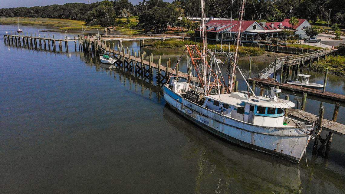 A sailboat and a shrimp boat, pictured here on Sept. 21, 2022, at the Port Royal shrimp dock. The town could receive another $1 million from the state this year for its efforts to replace the dock