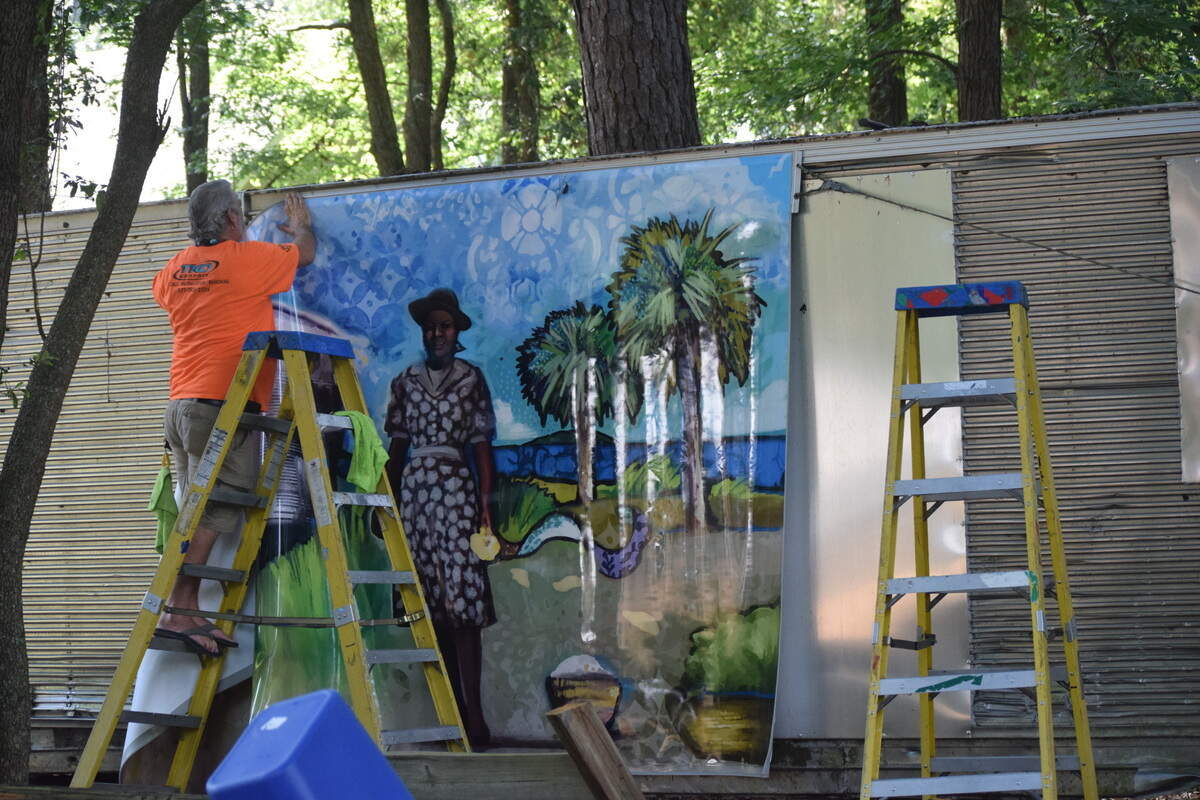 The Gullah Museum’s new mural was hung up on Wednesday, June 23, 2021.