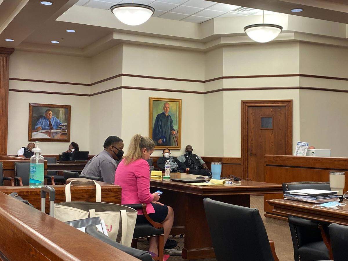 Jeffrey Redd (left) and his attorney Ashley Cornwell (right) sit at a table awaiting the jury to finish deliberations in Redd’s trial on Thursday, Feb. 17, 2022 where he is accused of murder and attempted murder in a 2019 Lady’s Island gas station shooting.
