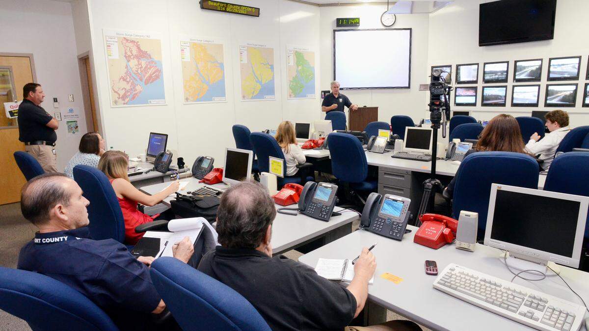 Beaufort County Emergency Management Division deputy director David Zeoli, standing at center, makes a presentation during the Beaufort County Hurricane Preparedness Media Day held on Wednesday at the Emergency Operations Center in Beaufort. Hurricane season begins on Saturday.