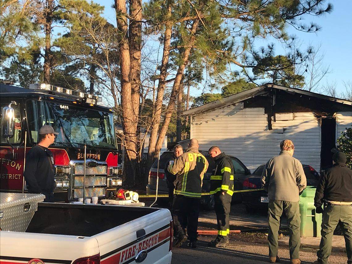 Firefighters and investigators work at the scene of a fatal mobile home fire around 8 a.m. Thursday in Bluffton.