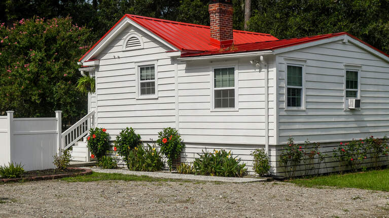 Once the kitchen for a SC plantation home is now a one-bedroom cottage. Look inside