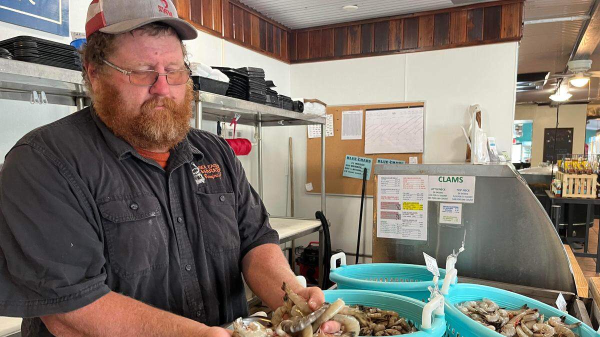 Craig Reaves started shrimping at 14 on summer breaks in the 1980s, was running his own boat at 17 and now owns Sea Eagle Market in Beaufort.