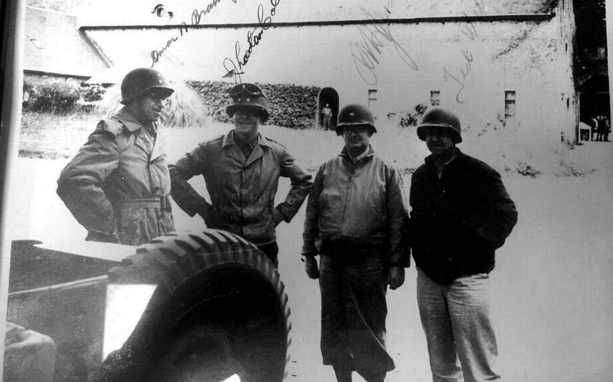 Bill Jeschke took a picture of this photograph featuring his grandfather, Richard "Hall" Jeschke, second from right, during World War II. Richard Jeschke was, in June 1944, a Marine Corps colonel who helped plan the amphibious assaults for the D-Day landings in Normandy.
