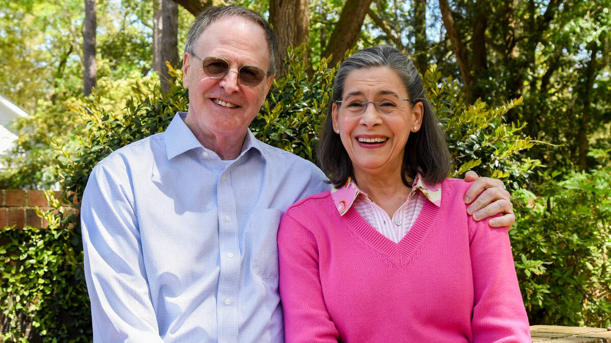 Russell “Rusty” Floyd and his wife Laura Floyd pose for a photo on April 9, 2024, on the grounds of First Presbyterian Church on Hilton Head Island. On May 19, Rusty will retire as the minister of music at the church, a position he has held since 1999.