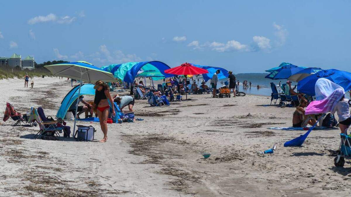 Beach goers enjoying an early start to Memorial Day weekend on May 23, 2024 at Folly Field Beach Park on Hilton Head Island illustrate the growing demand on the Low Country’s natural resources.