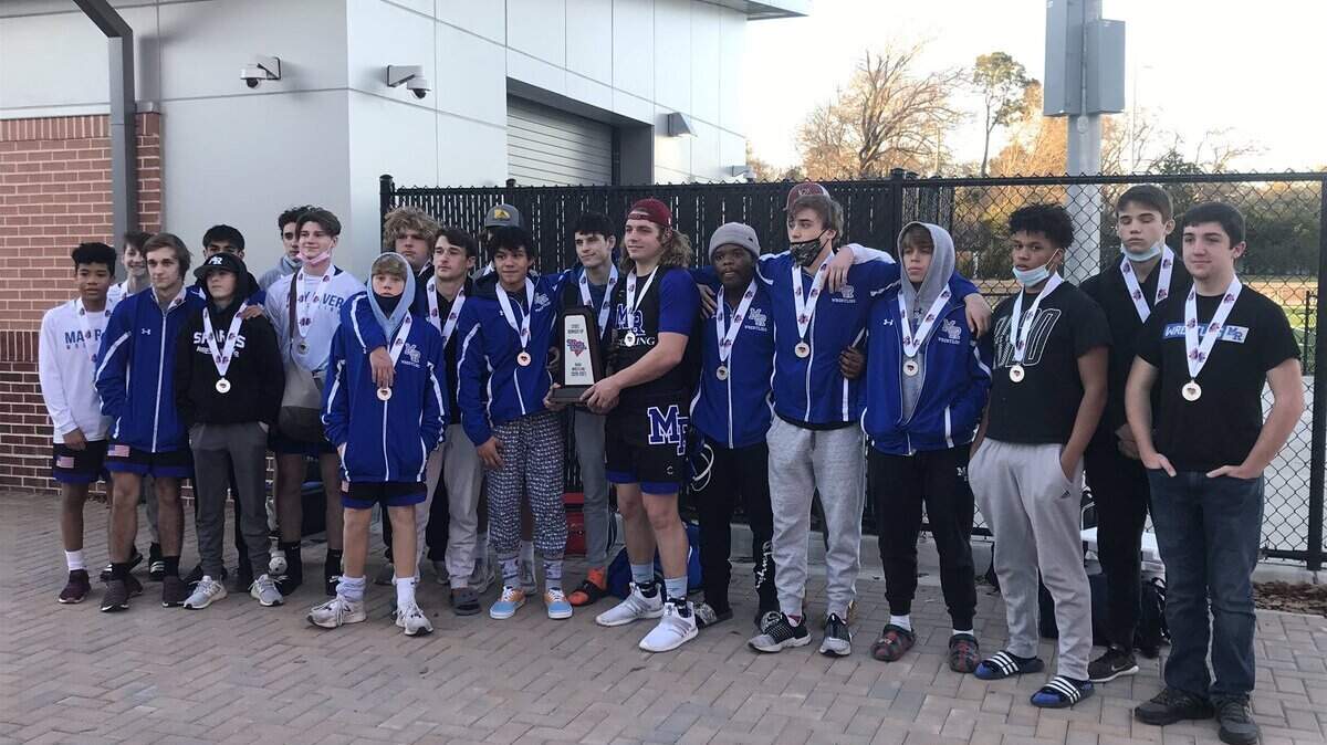 May River wrestlers pose with the runner-up trophy after the Class 4A championship match on Feb. 20, 2021 at Dreher High School.