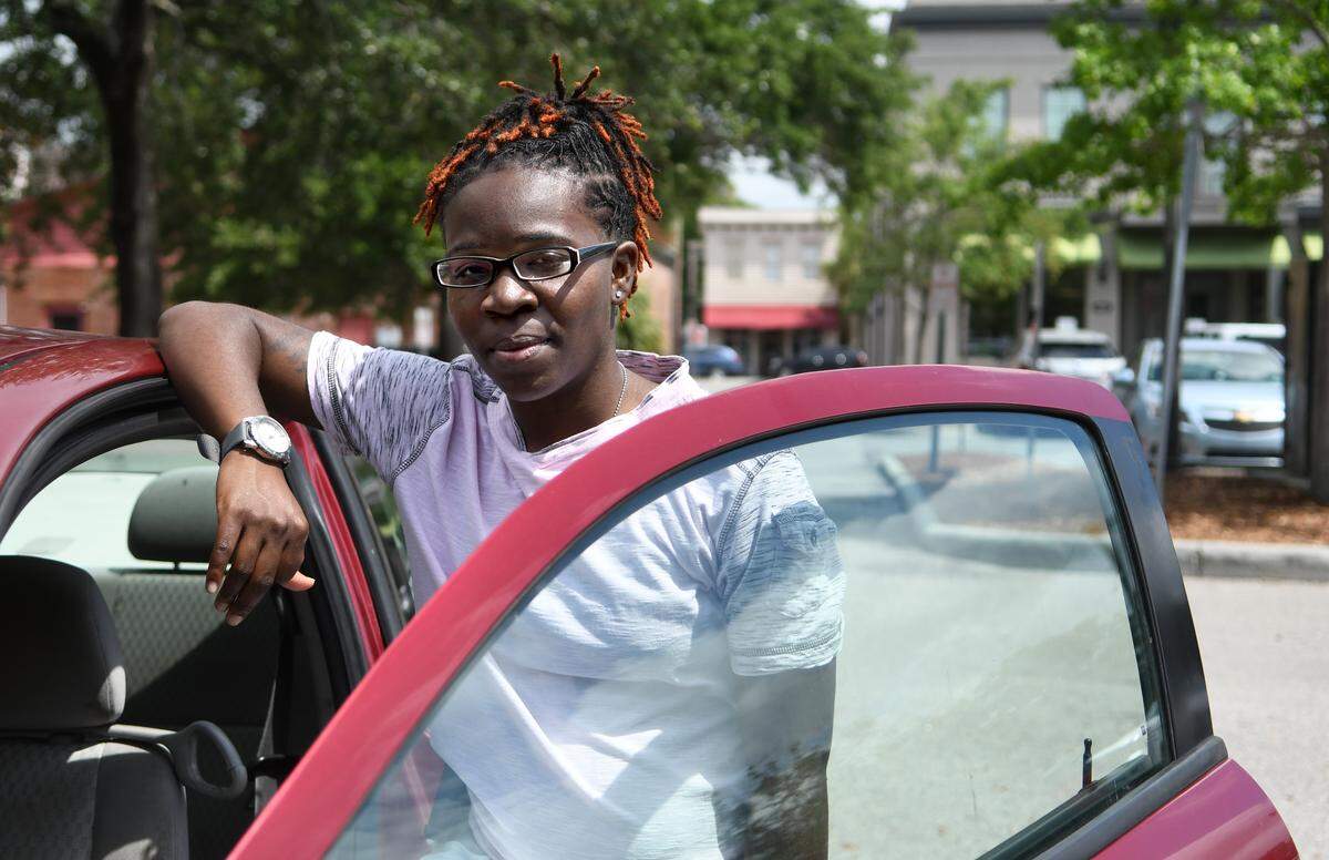 In this file photo, Beaufort resident Claraleanna Lockett stands at her car for a portrait at Henry C. Chambers Waterfront Park.