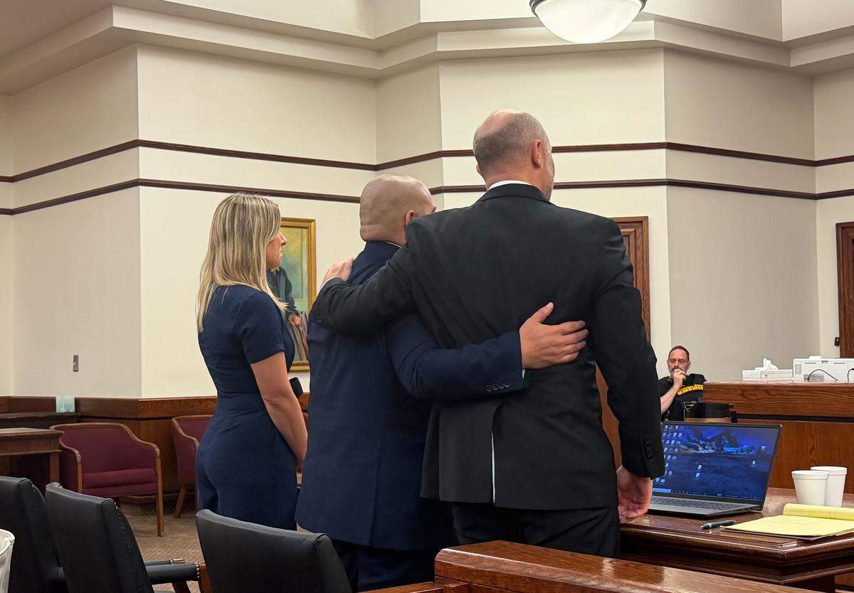 Former Bluffton police sergeant Bonifacio Perez, 41, embraced his defense attorney Ben Shelton after a jury found him not guilty of official misconduct on Sept. 25, 2025, in the Beaufort County Courthouse. Perez was accused of helping his civilian colleague Thomas Rauchfuss steal guns that had been surrendered to the Bluffton Police Department in the spring of 2024. Rauchfuss has yet to stand trial.