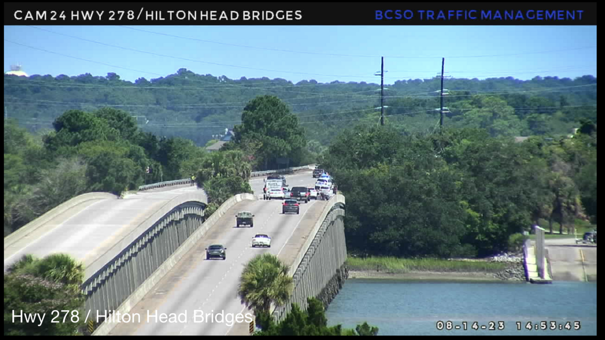 Emergency crews can be seen responding to a flipped car on the bridge heading off Hilton Head Island early Monday afternoon.