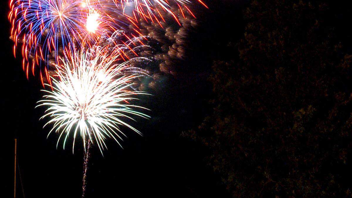 The crowd watches fireworks explode over the Beaufort River during the opening ceremonies of the 54th Annual Beaufort Water Festival on Friday evening. The 10-day festival continues today.