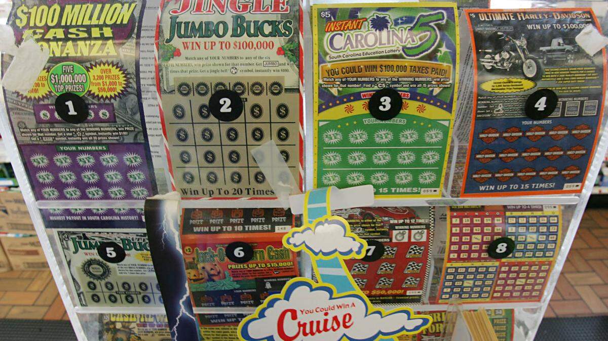 South Carolina Education Lottery scatch-off lottery tickets are displayed on the counter at the Exxon Station on Blossom Street Thursday, Dec. 29, 2005, in Columbia, S.C. A Bluffton woman won $1 million at a Publix store after popping in for a BOGO deal on cat food.