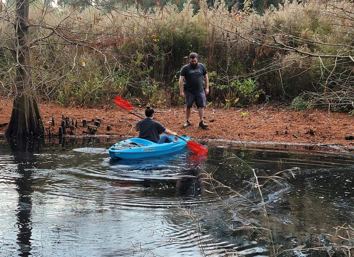Rescuers needed a kayak to reach an island were a dog was stranded at the Cypress Wetlands in Port Royal.