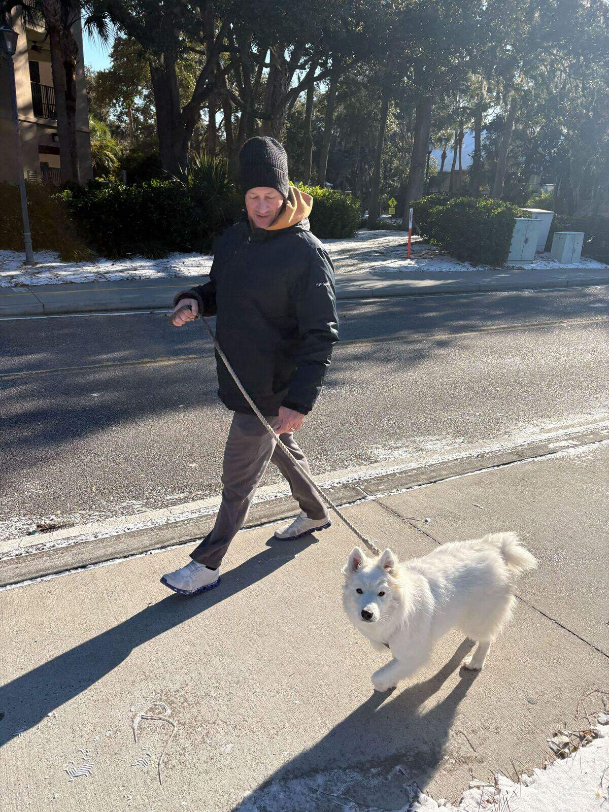 Wesley Totin and Puddles went for a morning walk in the snow Sunday, Feb. 1 on Hilton Head Island.