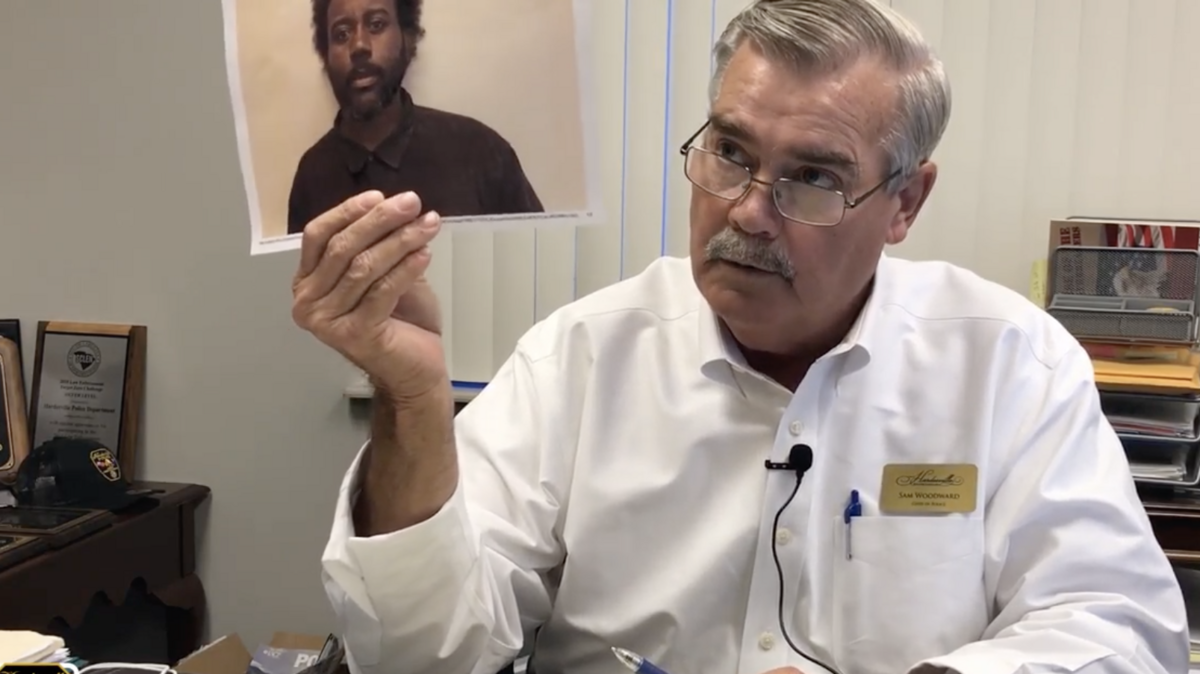 Hardeeville Police Chief Sam Woodward holds a photo of Derrick Roseberry following his arrest Oct. 27, 2021. “This guy is a brutal person who raped a young lady who was doing her job at the motel,” Woodward said.