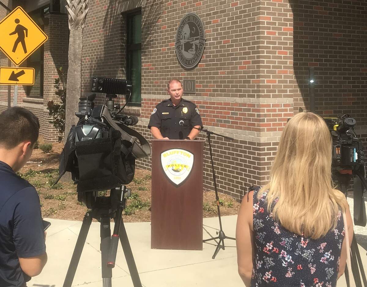 New Bluffton Police Department Chief Christopher Chapmond delivers a prepared statement at a news conference Thursday, Sept. 6, 2018, in Bluffton, S.C.