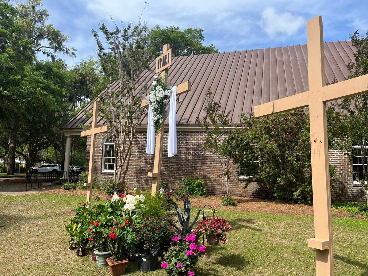 Crosses and flowers in front of St. Peter’s Catholic Church on Lady’s Island on Monday, the day after Easter Sunday.