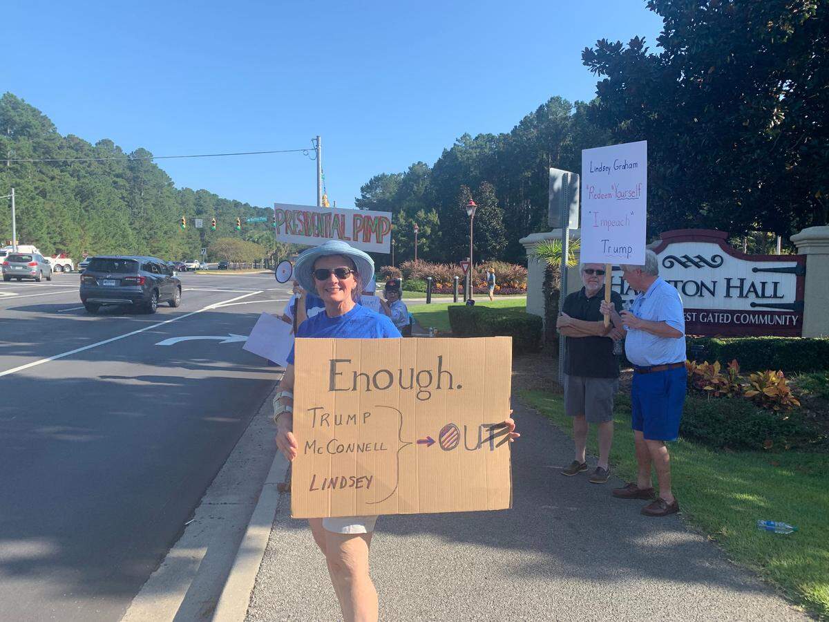A crowd of around 40 people protested Graham’s award outside of Hampton Hall Friday evening.