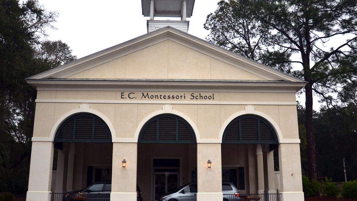 Parents wait in their vehicles for the children to get out of school outside of E.C. Montessori & Grade School Monday afternoon in Beaufort. The school celebrates its 40th anniversary this week.