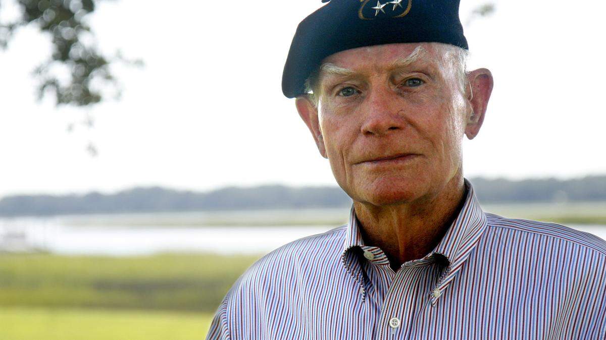 Lt. Gen. Pete Spragins, retired, poses for a photo  in September 2009 outside his Marsh Harbor home wearing the first black beret that he,  then a captain, got for his men in the 10th Airborne Ranger Company.