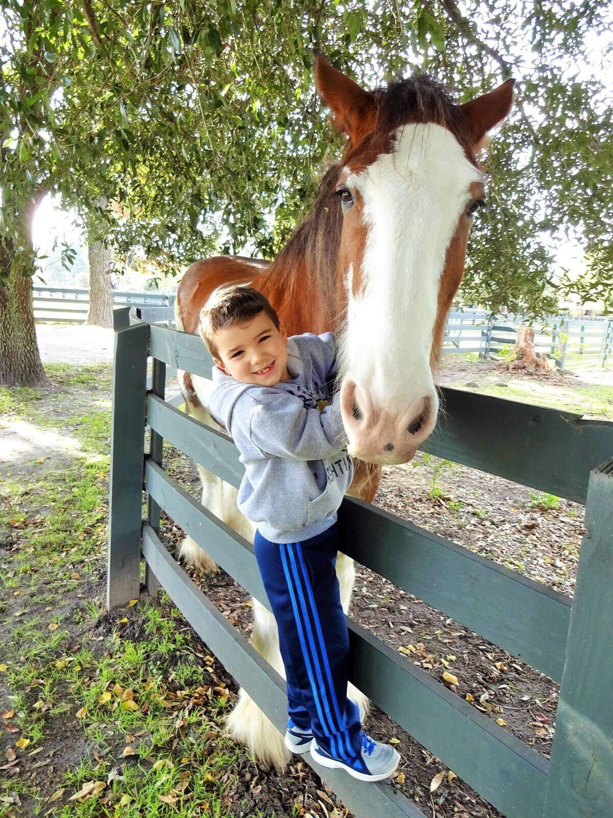 Christian Bilinksi spends time with Harley at Lawton Stables on Hilton Head island. Lisa Bilinski, Christian’s mom, said “we loved Harley! We would always come visit him when we were in town.”