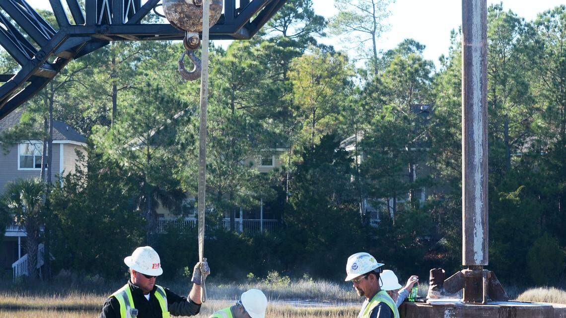 Work continues at the Bluffton Parkway flyover construction site on Dec. 16, 2013. The flyover will cost about $750,000 more than originally projected, but county officials planned for that circumstance with a $4 million contingency fund. The more than $36 million project includes construction of a 4,200-foot-long bridge segment over the marsh and 4,500 feet of road improvements. It is expected to be completed in October 2015.
