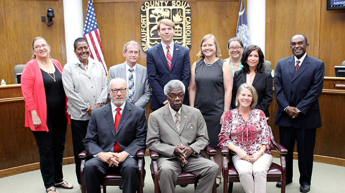 (Back row, from left) Beaufort County Board of Education members Mary Cordray, Cynthia Gregory-Smalls, John Dowling, Joseph Dunkle, Christina Gwozdz, Evva Anderson, JoAnn Orischak and Bill Payne. (Front row, from left) David Striebinger, Earl Campbell and Geri Kinton.