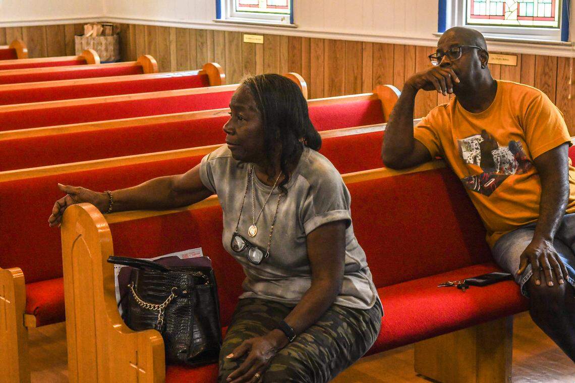 Mary Pope Mack, left, speaks about the lack of access to Big House Cemetery as her brother Jimmy Pope listens on July 10, 2024 at Nazareth Baptist Church on St. Helena Island. When the newspaper asked about getting access to the cemetery located at the end of their families property on Pope Estates Way, the family said their niece’s property at the end of the road blocks access.