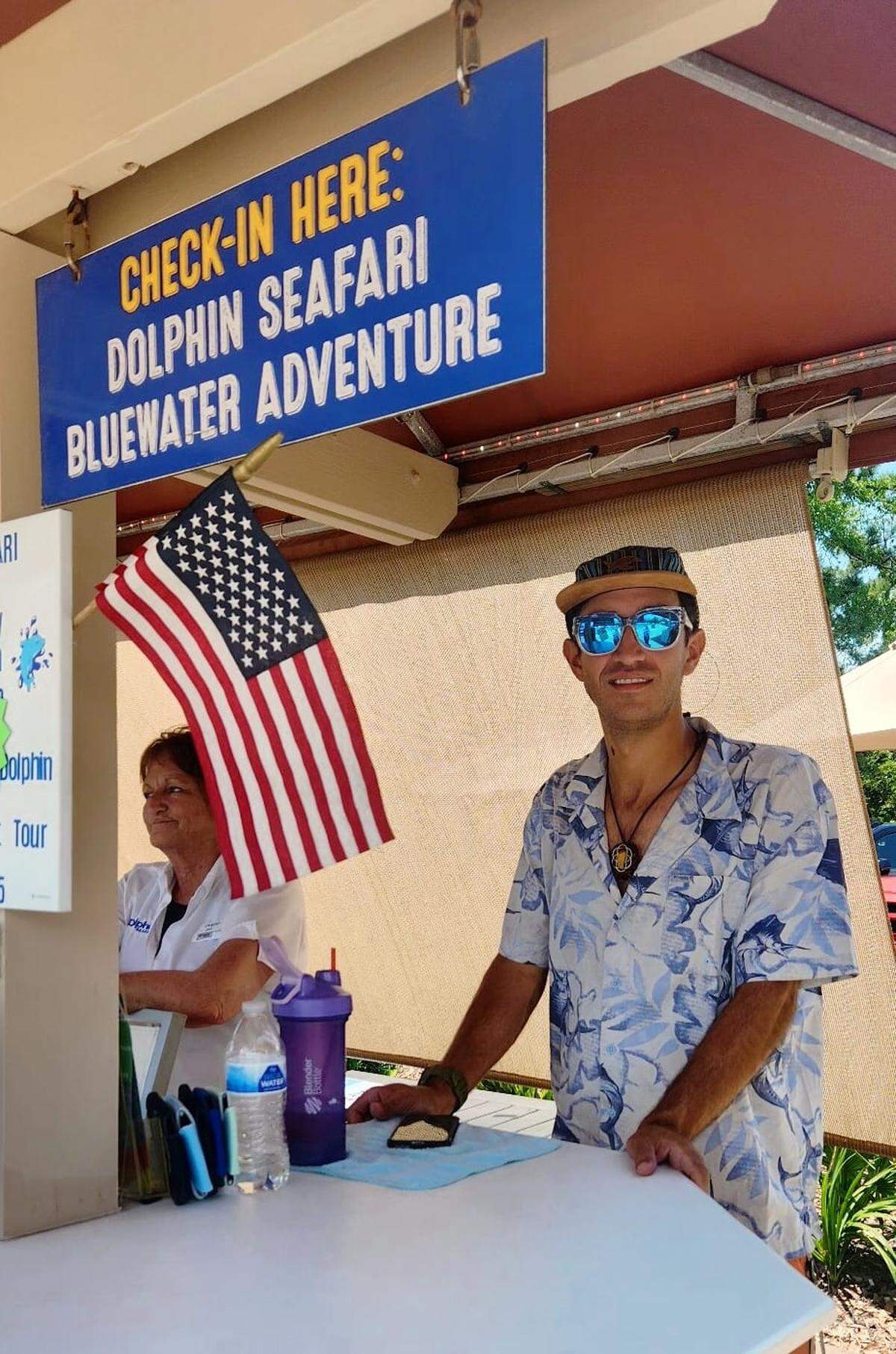 Breger working the check-in desk at Dolphin Seafari, one of his many Lowcountry side hustles.