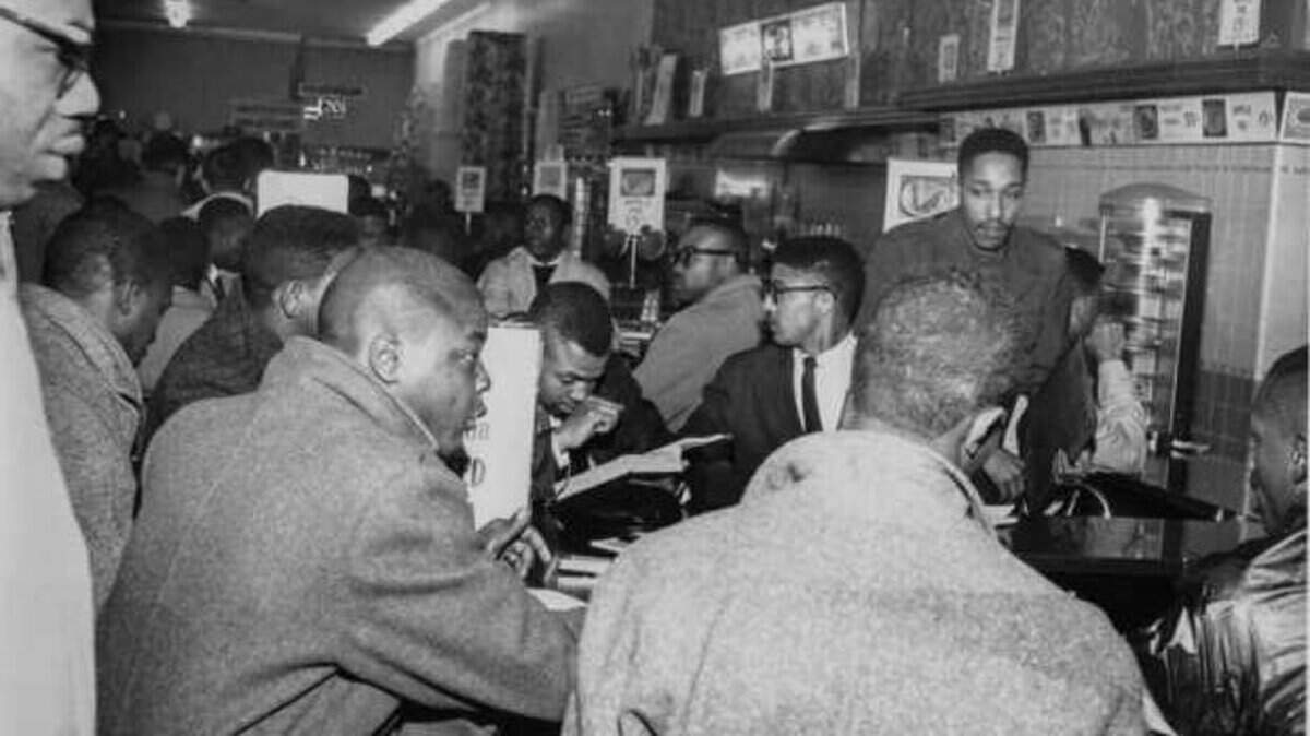 Students from Allen and Benedict colleges sit-in at a downtown Columbia drugstore. Allen student Simon Bouie, center with glasses, was later the focus of a U.S. Supreme Court decision overturning the city’s trespass statute.