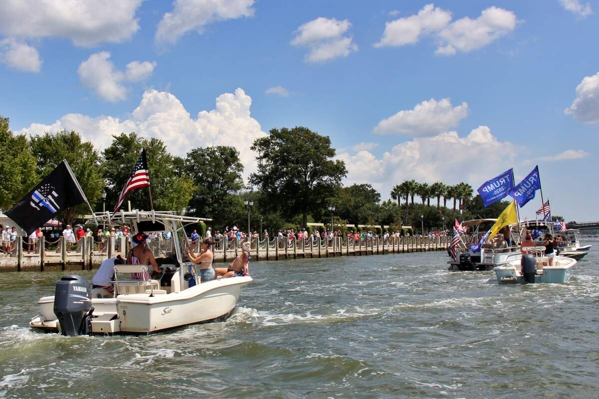 Boaters cruise by Henry C. Chambers Waterfront Park in downtown Beaufort, S.C. on Saturday, Sept. 5, 2020 during a parade in support of President Donald Trump.
