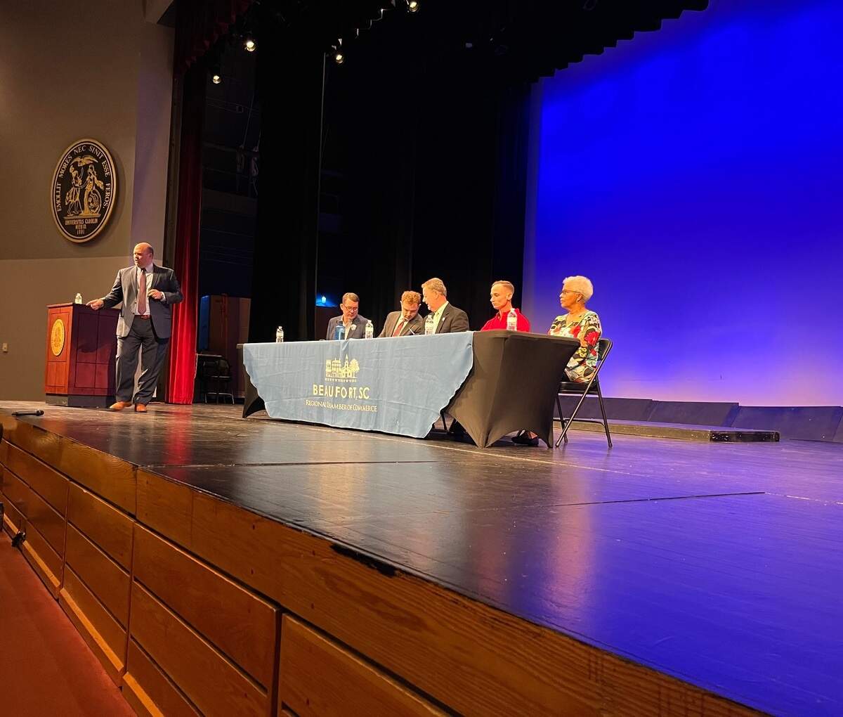 Five candidates for Beaufort City Council, and Ian Scott, the president of the Beaufort Regional Chamber of Commerce, prepare for a forum Wednesday at the University of South Carolina Beaufort. From left to right: Josh Gibson, Michael Andersen, Mike McFee, Josh Scallate and Wilma Holman. Scott, standing, was the moderator.