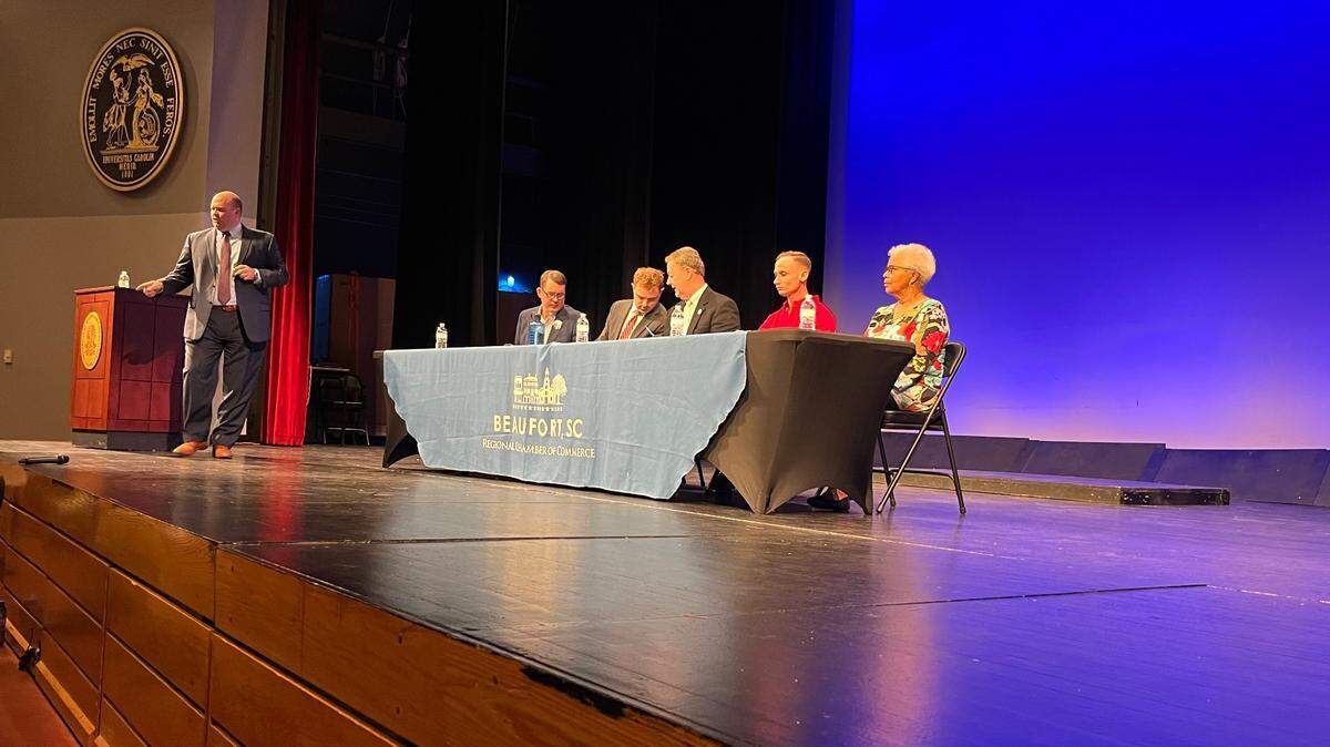 Five candidates for Beaufort City Council, and Ian Scott, the president of the Beaufort Regional Chamber of Commerce, prepare for a forum Wednesday at the University of South Carolina Beaufort. From left to right: Josh Gibson, Michael Andersen, Mike McFee, Josh Scallate and Wilma Holman. Scott, standing, was the moderator.