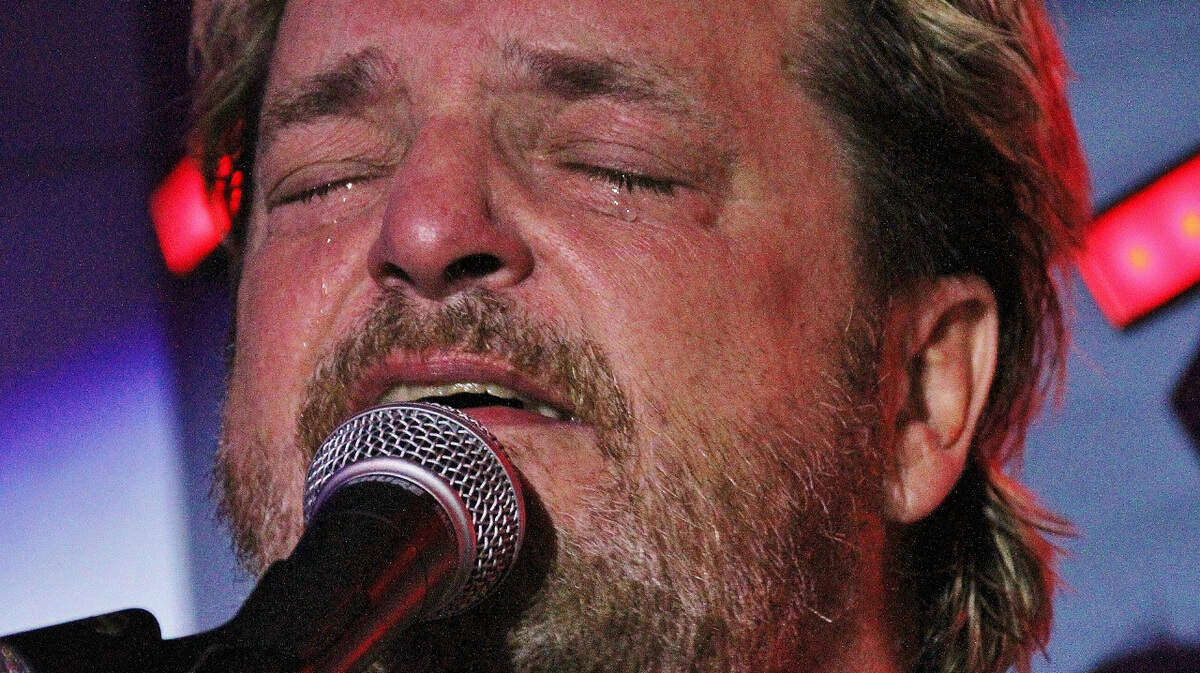 Tears of thanks from David Wingo as he performs at a benefit for his medical expenses on Sept. 15 at the Rooftop Bar at Poseidon.