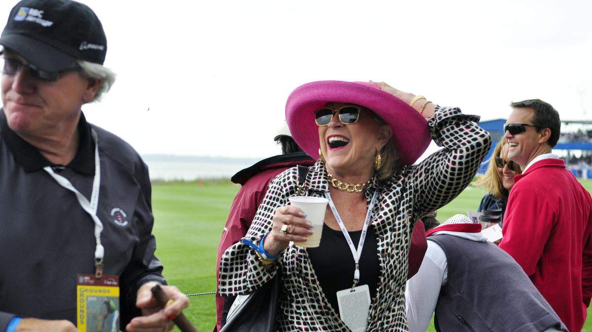 In this file photo from the 2013 RBC Heritage presented by Boeing, these unidentified participants enjoy the tournament, breeze and the cocktails.