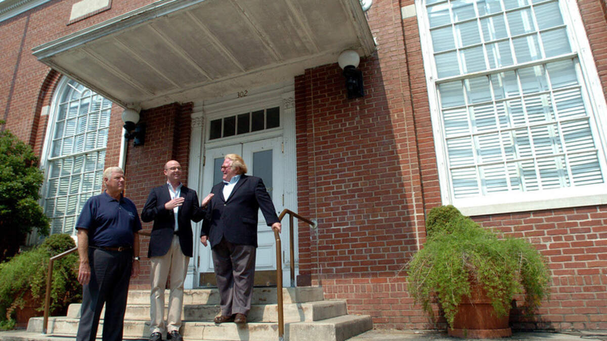 Beaufort Redevelopment Commission member Martin Goodman, Noel Garrett of Lowcountry Produce, and Beaufort Mayor Billy Keyserling address the media in front of the old Beaufort City Hall building Tuesday morning. The press conference was held to announce plans for the Carteret Street Lowcountry Produce store.