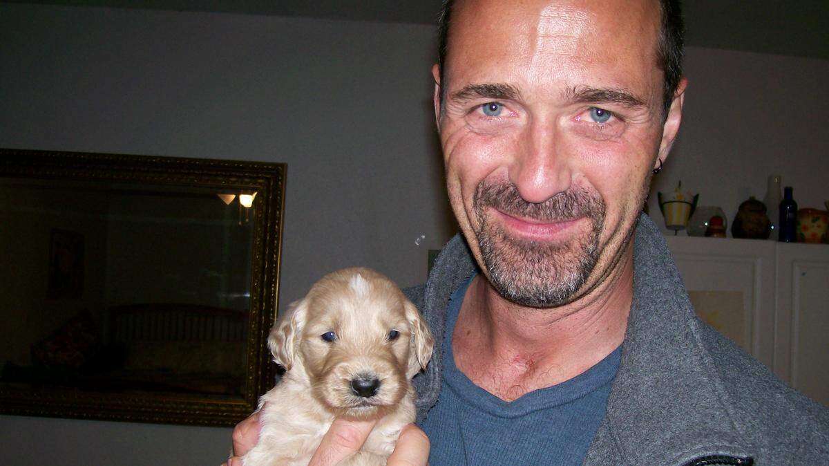 “Caleb” as a puppy, with owner Greg Critchley.